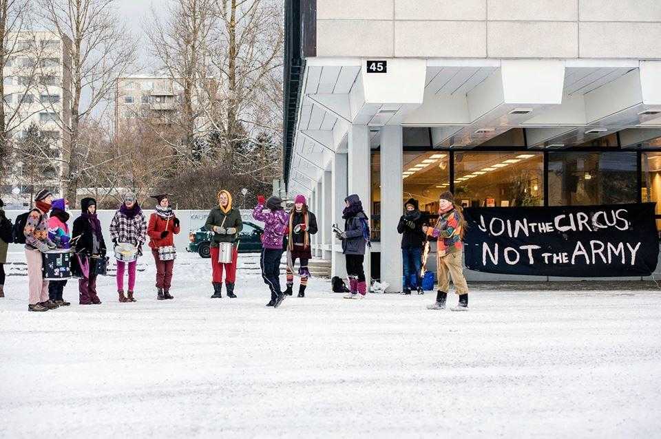 activists in FInland protesting in front of a recruitment centre as part of International Week of Action Against the Militarisation of Youth