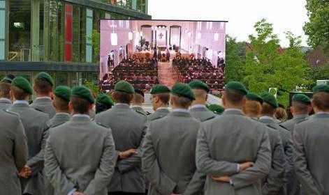 A dead soldier's funeral service is transmitted live on a big public screen in Detmold, June 2011  (credit - Michael Schulze von Glaßer)