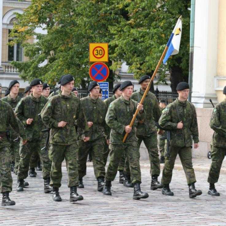 Soldiers marching in a military town