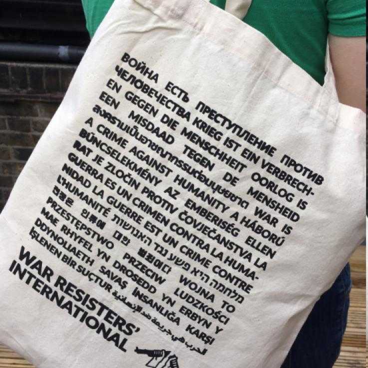 A plain "war is a crime against humanity" tote bag.