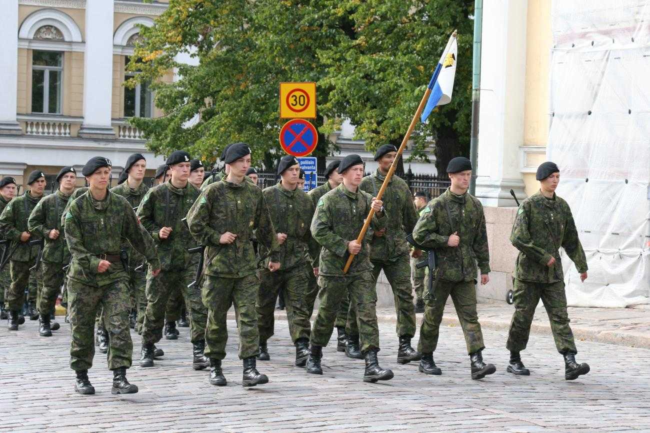 Soldiers marching in a military town