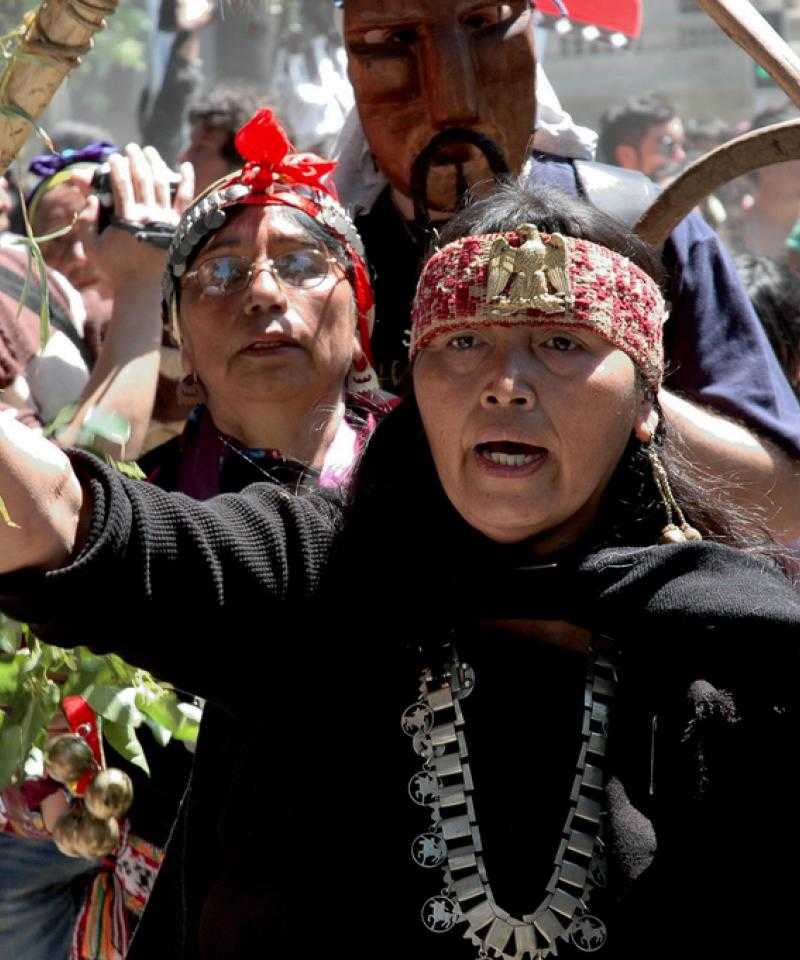 Several members of the Mapuche community taking part in a demonstration.