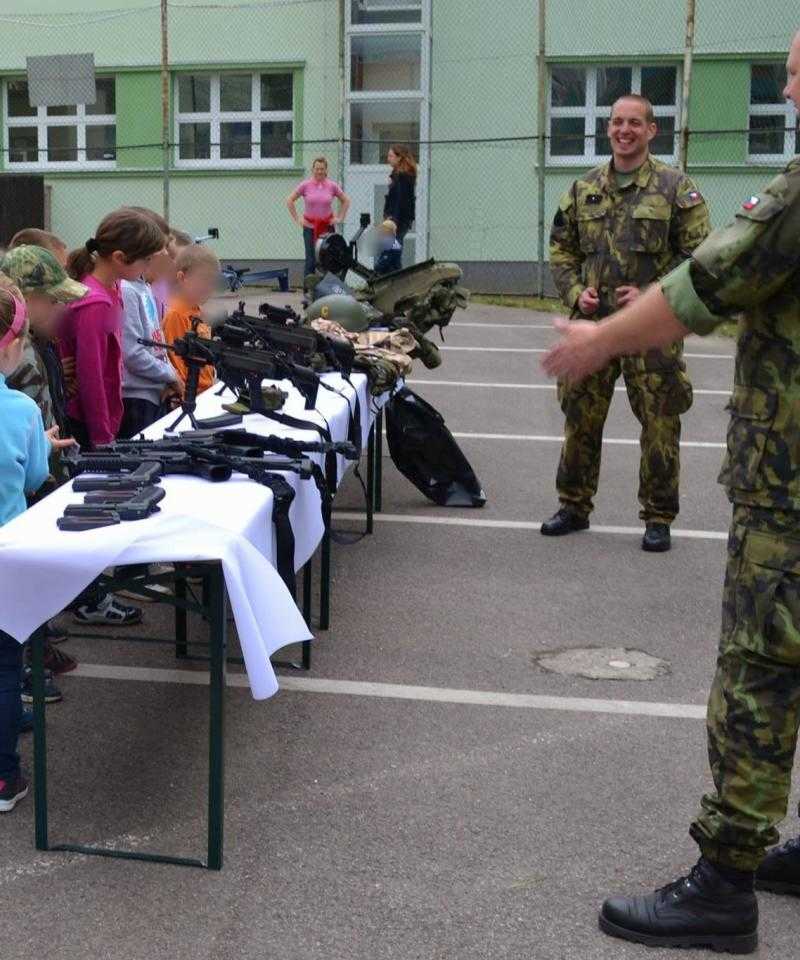 Military personnel visiting a school in Czech Republic