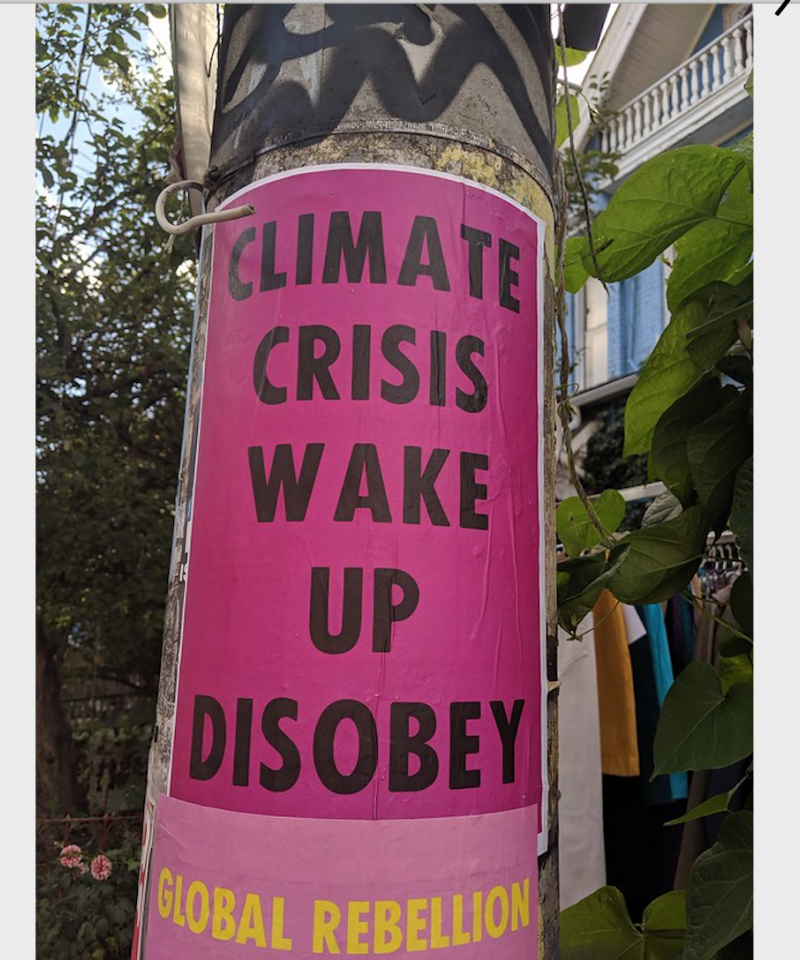 Street art from Toronto: Climate Crisis Wake Up Disobey sign