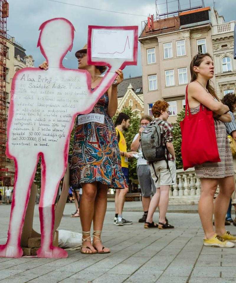 Activists in the Czech Republic protest against the IDET arms fair with cutout people with information about the arms trade written on them